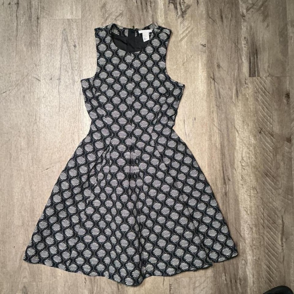 black and white polka dot dress with a touch of whimsy